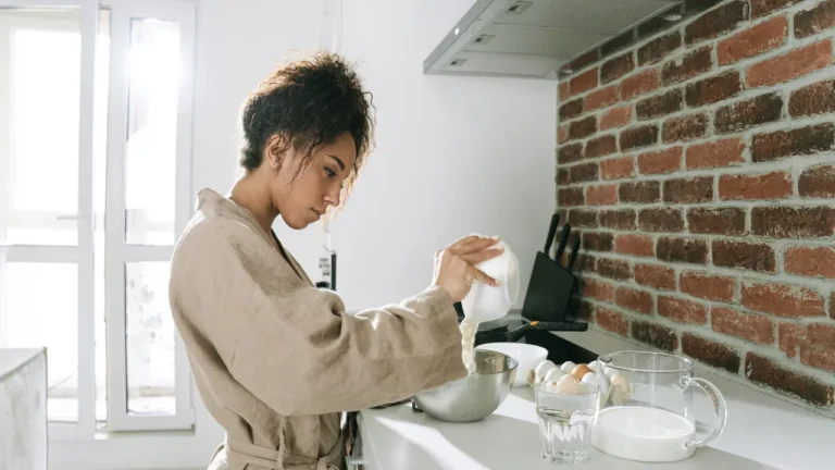 A women in the kitchen struggling with food noise